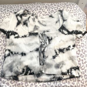 I am selling a black and white the dyed top from Garage.